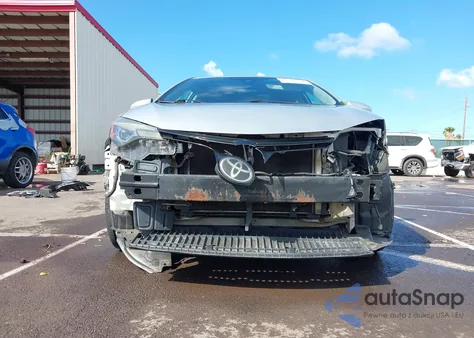 2017 Toyota Corolla Le z USA, uszkodzony, nr VIN 5YFBURHE4HP671433